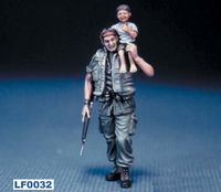 US Soldier with aVietnamese child on his shoulder - Image 1